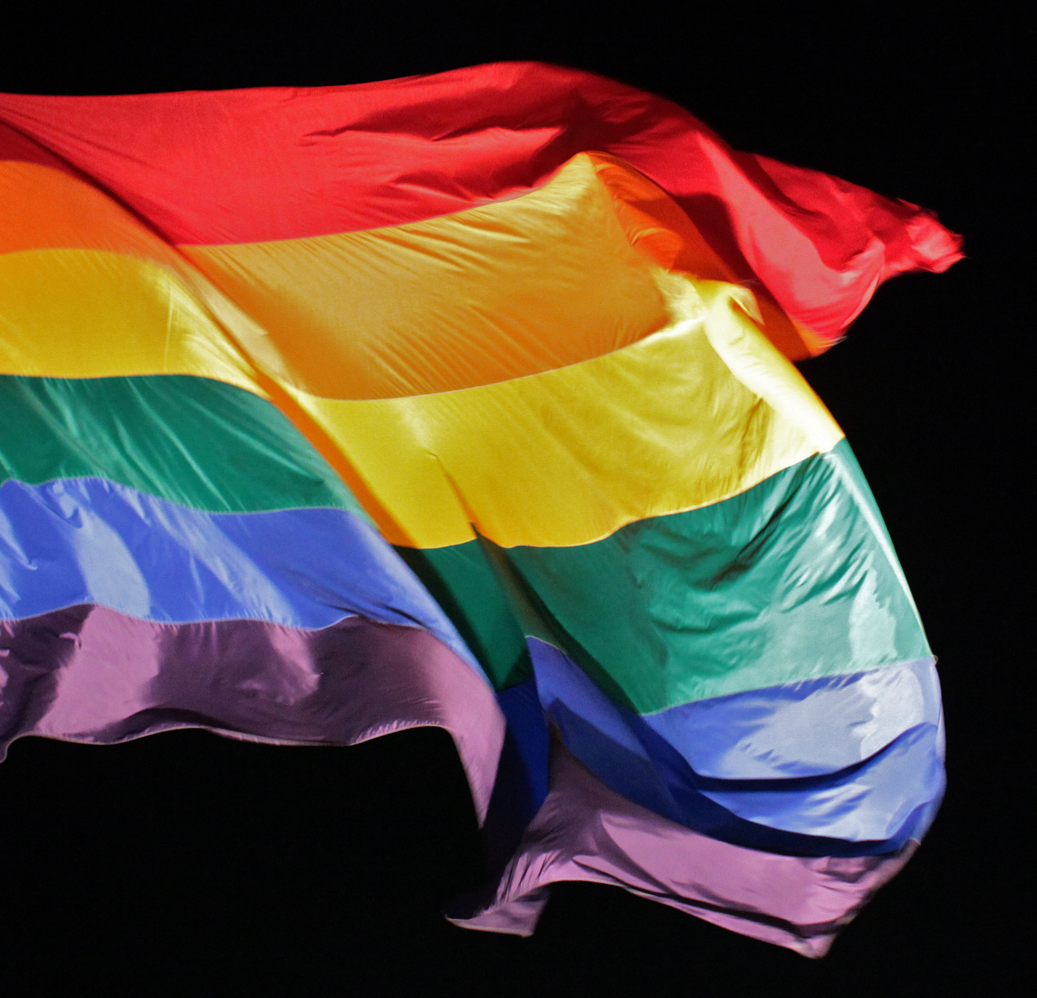 Rainbow pride flag at Harvey Milk Plaza in the Castro at night, San Francisco (2013). Photo: TorboKHopper/Flickr