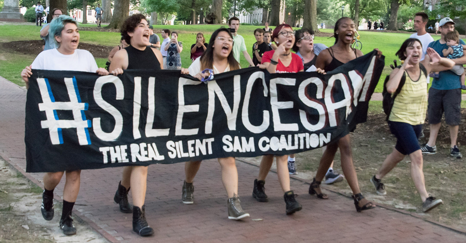 Protesters at a Silent Sam monument rally