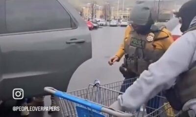 ice agents appear to rob from detained man